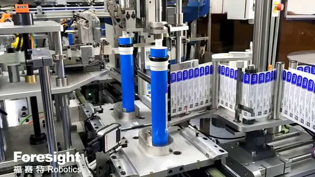 自动缠胶带及贴标工序 自动缠胶带及贴标工序