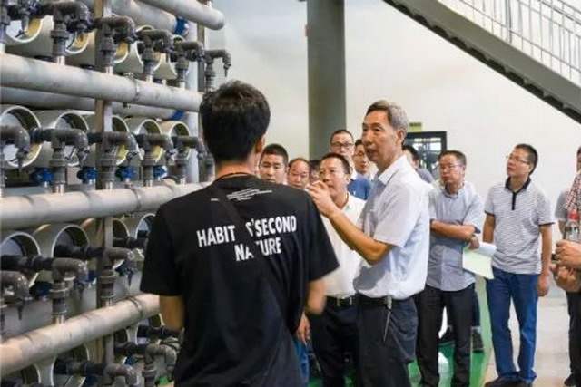 城镇污水厂清洁排放改造工作推进会考察稠江工业水厂