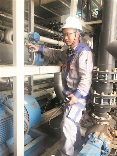 兴丰渗滤液处理厂陈炳森班长每年春节都坚守在岗位上 兴丰渗滤液处理厂陈炳森班长每年春节都坚守在岗位上